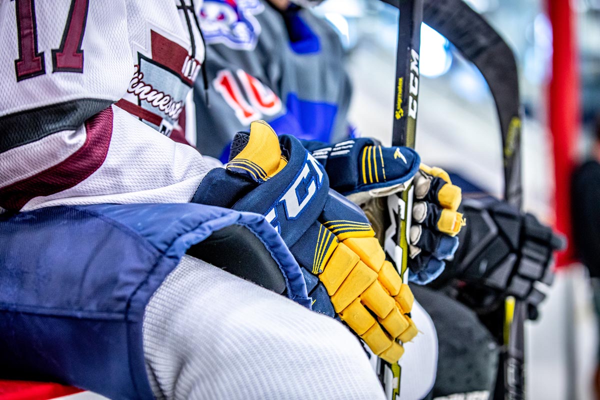 Hockey gloves on bench